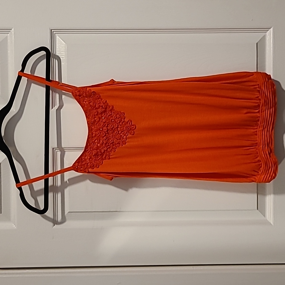 Express tank top, with knit floral derail under the neckline.  Size SP